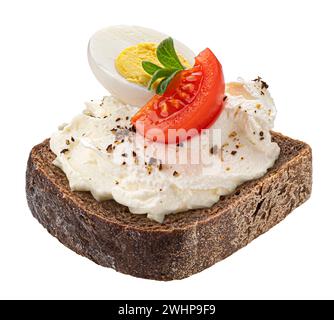 Slice of rye bread with cream cheese, tomato and egg isolated on white background Stock Photo