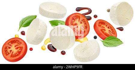 Mozzarella and tomato slices with basil and balsamic dressing isolated on white background Stock Photo