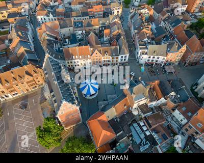 Halle, Flemish Brabant Region, Belgium, 06 09 2023, Sun rising over Halle, Aerial view, top down, of the Old market square with Stock Photo