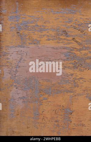 Vintage abstract rough aged textured orange background with empty space Stock Photo