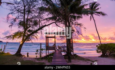 Romantic dinner on the beach in Koh Kood Thailand, couple having dinner on the beach during vacation Stock Photo