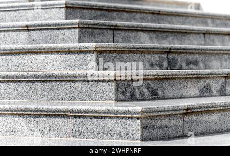 Steps of an empty stone granite staircase close up Stock Photo