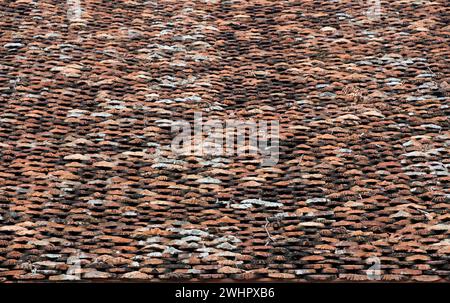 Earthenware rooftop brick tile background old tradition Stock Photo