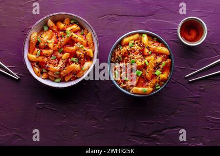 Tteokbokki or topokki and rabokki, Korean street food, spicy rice cakes Stock Photo