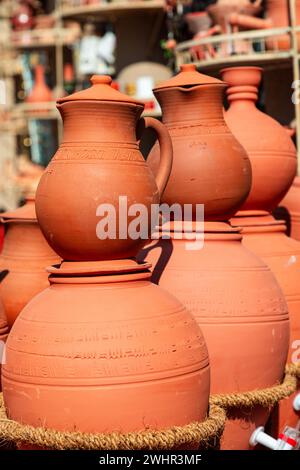 Traditional clay water jugs for sale on souk, Oman Stock Photo