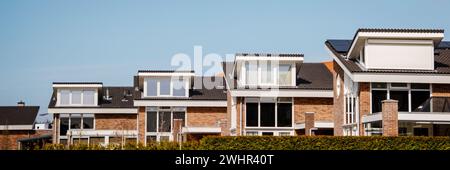 Dutch Suburban area with modern family houses, newly build moder Stock Photo