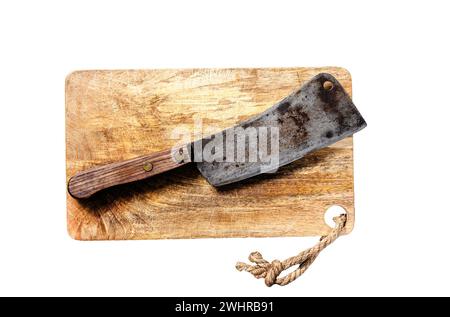 Meat cleaver on old scratched wooden cutting Board. Isolated on white background. Top view Stock Photo