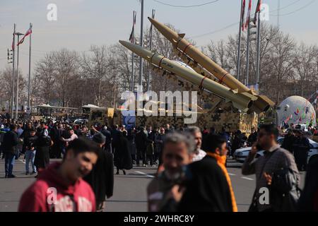 Tehran, Iran. 11th Feb, 2024. The Iranian-made missiles are displayed at Azadi (freedom) Square in Tehran as people gather to mark the 45th anniversary of the Islamic revolution in Tehran. Iran marked on 11 February 2024 the 45th anniversary of the 1979 Islamic Revolution amid tensions gripping the wider Middle East over Israel's continued war on Hamas in the Gaza Strip. Iranian president Ebrahim Raisi condemned arch-foe Israel and demanded it be expelled from the United Nations. (Credit Image: © Rouzbeh Fouladi/ZUMA Press Wire) EDITORIAL USAGE ONLY! Not for Commercial USAGE! Stock Photo