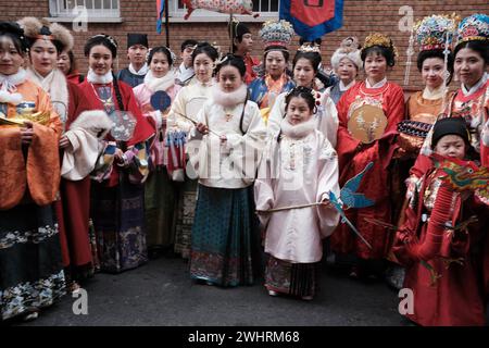 Several people during the Chinese New Year of the Year of the Dragon parade in the Usera district, on 11 February, 2024 in Madrid, Spain. Yesterday, F Stock Photo