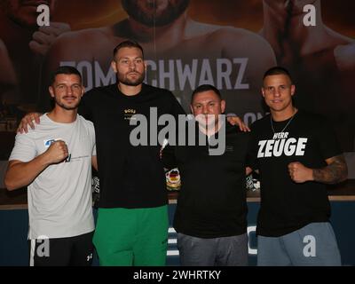 Boxer Ardian Krasniqi ,Tom Schwarz,Tyron Zeuge with promoter Burim Sylejmani from the Magdeburg boxing stable Fides at the press Stock Photo