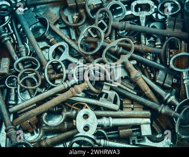 Heap of old, rusty lock key Stock Photo