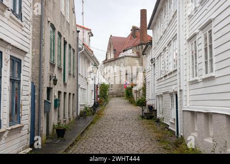 Street with traditional, white, wooden houses in Gamle Stavanger, the old town. Rogaland, Jaeren, Norway. Stock Photo