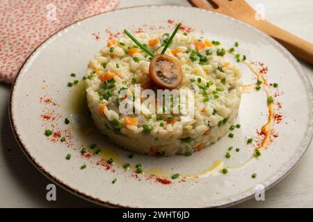 Delicious Italian risotto with vegetables. Stock Photo