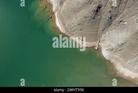 Drone aerial scenery of a toxic lake of an abandoned copper mine. Environmental pollution concept Stock Photo