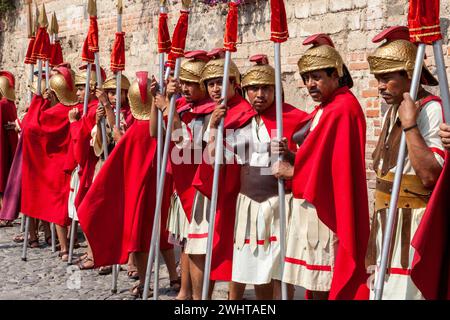 Antigua, Guatemala.  Historic Re-enactors as Roman Centurions, Semana Santa Procession on Good Friday. Stock Photo