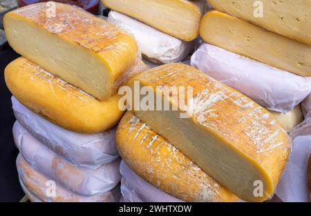 Aged to Perfection: Artisanal Cheeses on Display at a Local Market Stock Photo