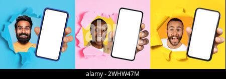 Three excited men of different ethnicities cheerfully pop through colorful paper backgrounds Stock Photo