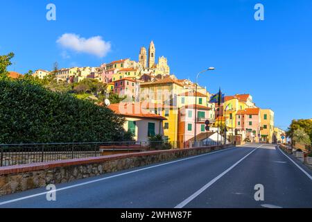 View from the coastal road of the hilltop medieval village of Cervo, along the Mediterranean Riviera in the Imperia Province of Liguria, Italy. Stock Photo