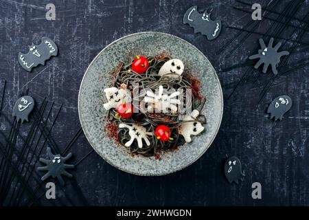 Traditional Halloween octopus spaghetti with Dracula spiders Stock Photo