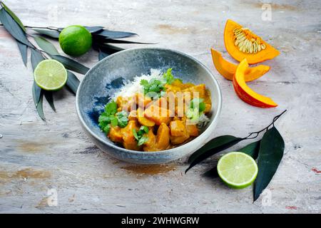 Traditional Indian vegetarian curry stew with sweet potatoes Stock Photo