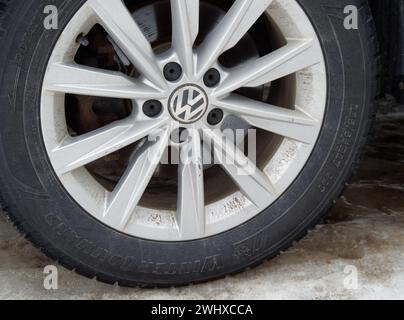 Close up of a winter tire on a Volkswagen wheel. Quebec,Canada Stock Photo