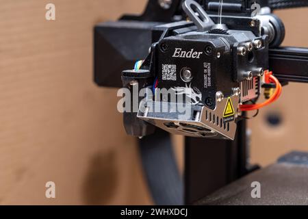 Ender brand 3D printer model moving print head extruder part closeup detail, nobody. 3D printing and printer models for self assembly simple concept, Stock Photo