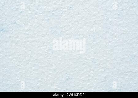 Simple white flat piece of styrofoam material structure background texture, seen from above, top view closeup detail shot, nobody Plain blank insulati Stock Photo