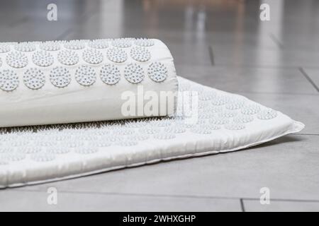 Close-up of orthopedic acupressure mat for self health massage at home and indoors Stock Photo