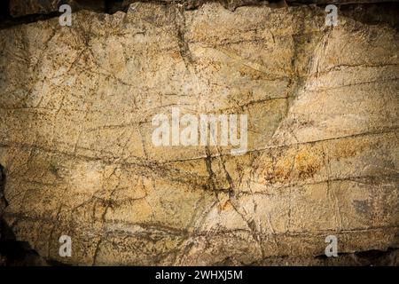 Dirty, scratched old stone wall Stock Photo