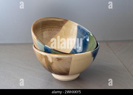 Two bowls on a grey table. High quality photo Stock Photo