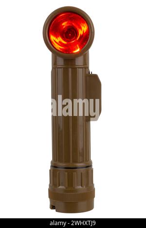 vintage military style flashlight with yellow light isolated on white ...