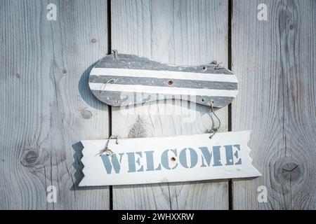 Wooden welcome sign in rustic style Stock Photo