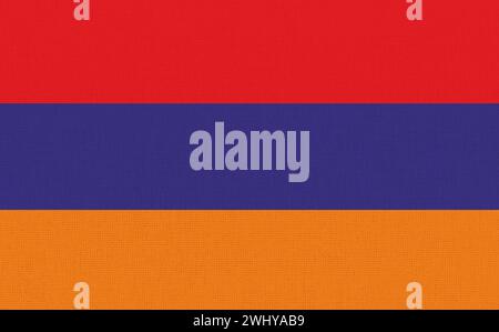 Flag of Armenia on fabric surface. Armenian national flag on textured background. Fabric Texture. Re Stock Photo