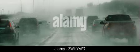 freeway traffic during a torrential rain storm in Houston, Texas - USA Stock Photo