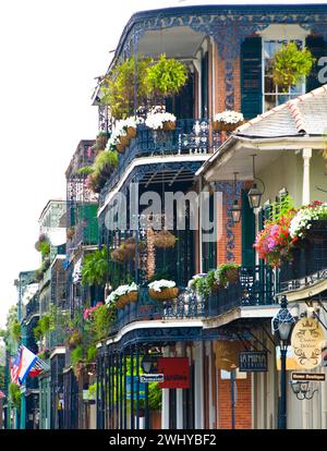 ornate iron grill work on French Quarter buildings in New Orleans, Louisiana - USA Stock Photo