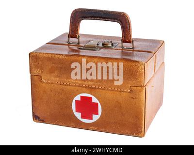 Old vintage leather medical first aid emergency suitcase isolated on white background Stock Photo