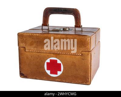 Old vintage leather medical first aid emergency suitcase isolated on white background Stock Photo