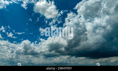 Drone View of a Summer Blue Sky With White Fluffy Clouds Stock Photo