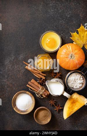 Baking background for Thanksgiving or autumn holidays. Homemade fall baking background with ingredients pumpkins, sugar, flour, Stock Photo