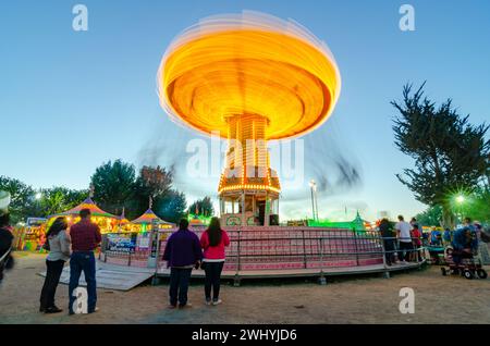 Sonoma County Fair, Colorful rides, Nighttime carnival, Ferris wheel, Long exposure, Vibrant lights, Amusement park Stock Photo