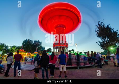 Sonoma County Fair, Colorful rides, Nighttime carnival, Ferris wheel, Long exposure, Vibrant lights, Amusement park Stock Photo