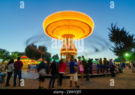 Sonoma County Fair, Colorful rides, Nighttime carnival, Ferris wheel, Long exposure, Vibrant lights, Amusement park Stock Photo