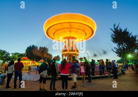 Sonoma County Fair, Colorful rides, Nighttime carnival, Ferris wheel, Long exposure, Vibrant lights, Amusement park Stock Photo