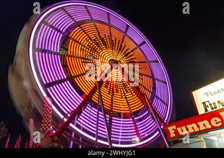 Sonoma County Fair, Colorful rides, Nighttime carnival, Ferris wheel, Long exposure, Vibrant lights, Amusement park Stock Photo