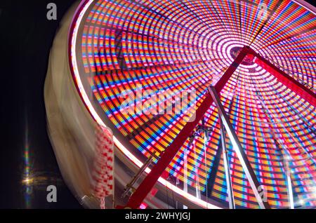 Sonoma County Fair, Colorful rides, Nighttime carnival, Ferris wheel, Long exposure, Vibrant lights, Amusement park Stock Photo