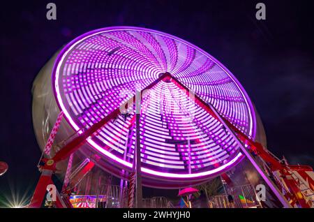 Sonoma County Fair, Colorful rides, Nighttime carnival, Ferris wheel, Long exposure, Vibrant lights, Amusement park Stock Photo