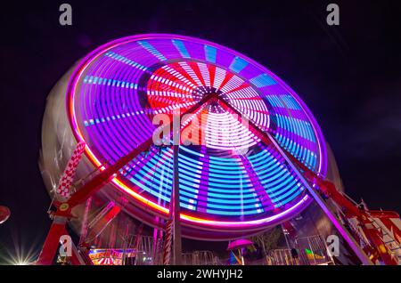 Sonoma County Fair, Colorful rides, Nighttime carnival, Ferris wheel, Long exposure, Vibrant lights, Amusement park Stock Photo