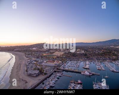 Aerial, Photo, Santa Barbara Harbor, Stearns Wharf, Downtown, Sunset, Brilliant, Purple, Blue, Coastal Cityscape, Aerial View, Waterfront, Pacific Stock Photo