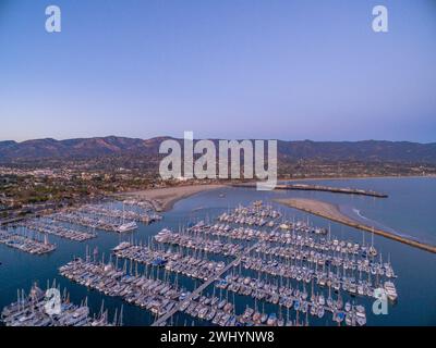 Aerial, Photo, Santa Barbara Harbor, Stearns Wharf, Downtown, Sunset, Brilliant, Purple, Blue, Coastal Cityscape, Aerial View, Waterfront, Pacific Stock Photo