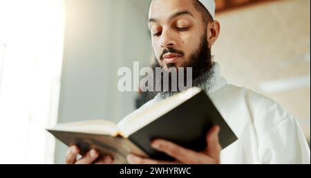 Islamic man, reading quran and mosque with faith, reading and mindfulness with worship, search and study. Muslim person, religion and peace with book Stock Photo